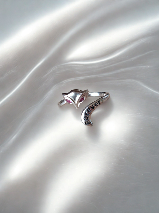 92.5 Silver ring with owl design and 'forever' engraving on a satin surface